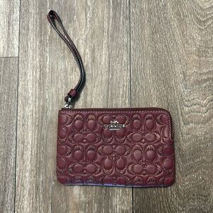 Coach deep purple wallet.